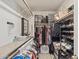 Walk-in closet with clothes and accessories at 17229 N 51St Dr, Glendale, AZ 85308