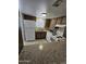 Functional kitchen with tile floors, standard appliances and ample cabinetry at 189 Laguna E Dr, Litchfield Park, AZ 85340