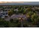 Dusk aerial view of neighborhood at 21228 E Excelsior Ave, Queen Creek, AZ 85142