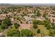Aerial view of a neighborhood with houses and large lots at 21228 E Excelsior Ave, Queen Creek, AZ 85142