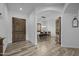 Welcoming entryway with hardwood floors and views of the dining room at 21228 E Excelsior Ave, Queen Creek, AZ 85142