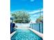 Refreshing in-ground pool with clear blue water and a privacy fence, perfect for relaxation at 2335 W Campus Dr, Phoenix, AZ 85015