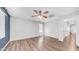 Bright and airy bedroom showcasing a ceiling fan and ample natural light at 2668 N 73Rd Gln, Phoenix, AZ 85035