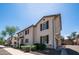 A well-maintained two-story home with shutters, lush landscaping, and a welcoming facade at 2668 N 73Rd Gln, Phoenix, AZ 85035