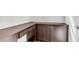 Cozy office space featuring custom built-in cabinets, drawers, and a desktop workspace at 2668 N 73Rd Gln, Phoenix, AZ 85035
