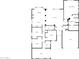 Detailed floor plan featuring the kitchen, living room, bedrooms, garages, and more in a well-designed layout at 2971 N Rosewood Ave, Casa Grande, AZ 85122
