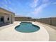 Backyard pool, surrounded by concrete and block wall, perfect for summer fun and relaxation at 2971 N Rosewood Ave, Casa Grande, AZ 85122