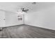 Bedroom features wood floors and white walls at 3002 W Mandalay Ln, Phoenix, AZ 85053