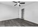 Bedroom featuring wood floors and a closet at 3002 W Mandalay Ln, Phoenix, AZ 85053