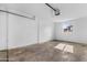This unfinished garage offers a window for light and neutral paint, ready for customization at 3002 W Mandalay Ln, Phoenix, AZ 85053