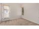 Bedroom featuring neutral carpet, a private balcony and a small window at 3150 E Beardsley Rd # 1091, Phoenix, AZ 85050