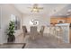 Dining room with a stylish table, seating for six, and a convenient breakfast bar at 3150 E Beardsley Rd # 1091, Phoenix, AZ 85050