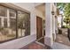 Welcoming entrance features brick-paved walkway, decorative columns, and a stylish front door at 3150 E Beardsley Rd # 1091, Phoenix, AZ 85050