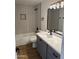 Bright bathroom featuring updated fixtures, sleek vanity, bathtub, and modern tile work in shower at 3517 E Blanche Dr, Phoenix, AZ 85032