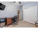 The office space offers a workspace with a desk, ceiling fan, and closet providing practicality and comfort at 42406 W Posada Dr, Maricopa, AZ 85138