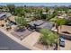 Single-Gathering home with an attached two car garage, solar panels, and a low maintenance yard at 511 E Port Au Prince Ln, Phoenix, AZ 85022
