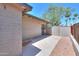 Private back patio area with access door to the building at 511 E Port Au Prince Ln, Phoenix, AZ 85022