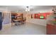 Open-concept kitchen and dining area with modern appliances, and ample space for entertaining at 511 E Port Au Prince Ln, Phoenix, AZ 85022