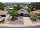 Charming single-Gathering home with an attached two car garage and a neatly landscaped front yard at 511 E Port Au Prince Ln, Phoenix, AZ 85022