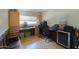 A well-lit office space with built-in desk and storage, ideal for remote work at 511 E Port Au Prince Ln, Phoenix, AZ 85022