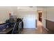Home office area featuring a closet and an adjacent dark walled room at 511 E Port Au Prince Ln, Phoenix, AZ 85022