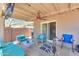 Relaxing covered patio space perfect for outdoor entertaining, complete with ceiling fan at 511 E Port Au Prince Ln, Phoenix, AZ 85022