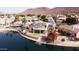 Waterfront home with putting green, a private dock, and solar panels at 5281 W Quail Ave, Glendale, AZ 85308