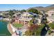Expansive backyard with private waterfront access, putting green and multiple seating areas at 5281 W Quail Ave, Glendale, AZ 85308