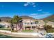 Stunning backyard with lush landscaping, patio, and private boat dock access to the canal at 5281 W Quail Ave, Glendale, AZ 85308