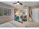 Comfortable bedroom with window shutters, neutral decor, and charming accents at 5281 W Quail Ave, Glendale, AZ 85308