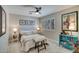 Comfortable bedroom with window shutters, neutral decor, and charming accents at 5281 W Quail Ave, Glendale, AZ 85308