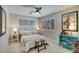 Comfortable bedroom with window shutters, neutral decor, and charming accents at 5281 W Quail Ave, Glendale, AZ 85308