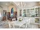 Bright dining room features a chandelier, built-in cabinets, and seating for six people at 5281 W Quail Ave, Glendale, AZ 85308