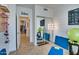 Bright exercise room featuring a wall mirror, exercise equipment, and an open doorway at 5281 W Quail Ave, Glendale, AZ 85308