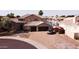 Beautiful home featuring desert landscaping, a circular driveway and a three-car garage at 5281 W Quail Ave, Glendale, AZ 85308