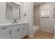 Stylish bathroom with modern vanity, fixtures, and a combined shower and tub at 5635 S 11Th Dr, Phoenix, AZ 85041