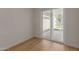 Bedroom featuring modern sliding glass door to the outdoor patio and backyard at 5635 S 11Th Dr, Phoenix, AZ 85041