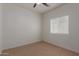 Relaxing bedroom with natural light from the window and carpeted floors at 5635 S 11Th Dr, Phoenix, AZ 85041