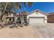 Charming single-story home featuring a two-car garage and low maintenance desert landscaping at 5635 S 11Th Dr, Phoenix, AZ 85041