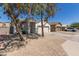 View of home's front elevation, xeriscaped yard, and well-maintained surroundings at 5635 S 11Th Dr, Phoenix, AZ 85041