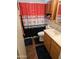 Cozy bathroom featuring a toilet, a sink vanity, and a shower with a curtain and an orange accent towel at 5728 E Dodge St, Mesa, AZ 85205