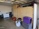 Organized garage with built-in cabinets, offering ample storage space for tools and equipment at 5728 E Dodge St, Mesa, AZ 85205