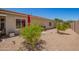 Low maintenance backyard with mature trees and desert landscaping, perfect for outdoor living at 5735 S Cloverdale Ln, Gilbert, AZ 85298
