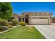 Charming single-Gathering home featuring a well-maintained lawn and two-car garage in a desirable neighborhood at 5735 S Cloverdale Ln, Gilbert, AZ 85298