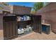 Pool storage cabinet stocked with accessories and equipment, keeping the backyard organized and clutter-free at 5735 S Cloverdale Ln, Gilbert, AZ 85298