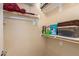 Organized walk-in closet with shelving, hanging racks, and plenty of storage space at 5735 S Cloverdale Ln, Gilbert, AZ 85298