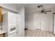 View of kitchen features stainless refrigerator with tile flooring throughout at 635 W Flower Ave, Mesa, AZ 85210