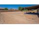 Large backyard with covered patio space perfect for enjoying the outdoors and entertaining guests at 6944 E Gary Cir, Mesa, AZ 85207