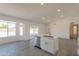 This bright kitchen features an island with bar seating, stainless steel appliances and plenty of cabinet space at 6944 E Gary Cir, Mesa, AZ 85207