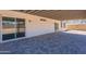Covered patio area featuring custom pavers and offering a seamless indoor-outdoor living experience at 6944 E Gary Cir, Mesa, AZ 85207